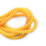 orange, yellow and clear cable twist for cochlear implants and hearing aids