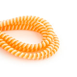 orange, yellow and white cable twist for cochlear implants and hearing aids